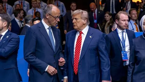 Donald Trump este miércoles en La Haya junto al canciller alemán, Friedrich Merz | Foto de la OTAN