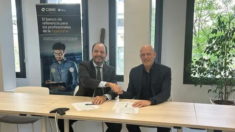 Fotograf&iacute;a de la firma del acuerdo entre CBNK y AEC