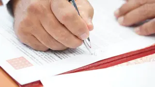 Imagen de archivo de la firma de un contrato