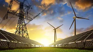 Torres de alta tensi&oacute;n y molinos y placas solares - Foto de la CNMC