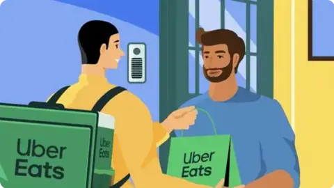 Repartidor entrega un pedido en un domicilio - Imagen de Uber Eats